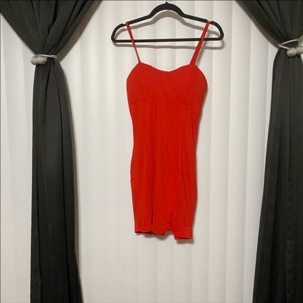 Red bodycon , lightly padded, with straps dress